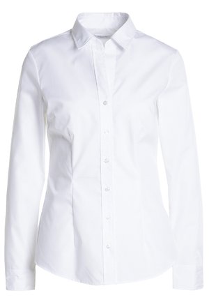 Hvid skjorte med lange ærmer, spidse kraver og et tætsiddende design. Fremstillet af glat stof med en subtil glans. Har en knaplukning.