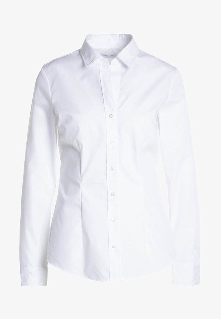 Weißes Hemd mit langen Ärmeln, spitzem Kragen und taillierter Passform. Hergestellt aus glattem Stoff mit subtiler Schattierung. Verfügt über eine Knopfleiste.
