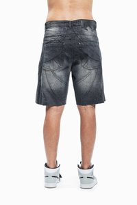 Dark wash denim shorts with a faded design, featuring back pockets and visible stitching details. Worn with grey high-top sneakers.