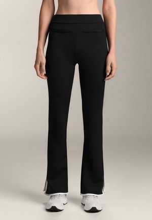 FLARED WITH CONTRASTING DETAIL - Stoffhose - black