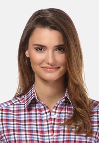 Checkered button-up shirt featuring red, blue, and white squares. Material has a smooth texture with a classic collar and white buttons.