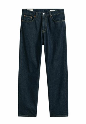 Donkerblauwe spijkerbroek met knopen en rits aan de voorkant, vijf zakken en contrasterende oranje stiksels.