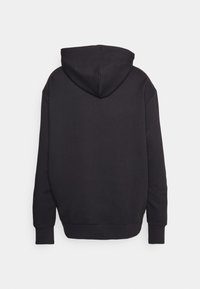 Black hoodie made of soft cotton blend, featuring a lined hood, ribbed cuffs, and a plain back design without any graphics or patterns.