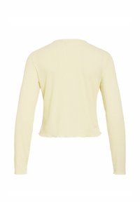 Haut crème à manches longues en maille côtelée avec un col rond et un ourlet légèrement froncé, vue de dos.