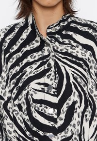 Bimba Y Lola Mono - zebra marfil