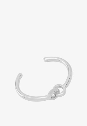 Silver cuff bracelet featuring a curved design with a linked accent. Smooth texture and shiny finish enhance its modern look.