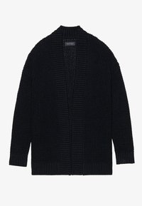 Svartstickad kofta med öppen framkant, ribbade kanter och långa ärmar. Texturerat tyg och en lös passform skapar en avslappnad silhuett.