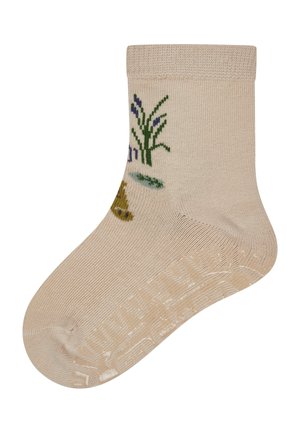 Beige sock with ribbed cuff, featuring embroidered green grass and blue flowers, textured snug fit with reinforced toe and heel.