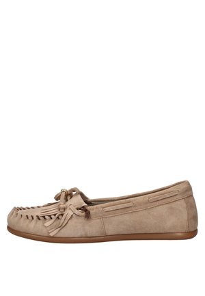 Beige suede moccasin shoe with fringe and bow detail, flat sole, and stitched toe design.