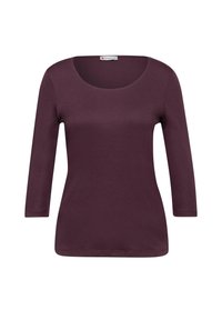 Burgundské tričko s dlouhým rukávem a výstřihem do oblouku, měkkou texturou a přiléhavým střihem. Dokončeno lemem sahajícím pod boky.