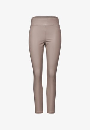 Leggings doux et ajustés dans une couleur taupe neutre. Fabriqués en matériau lisse et extensible avec une taille haute et des détails de couture soignés.