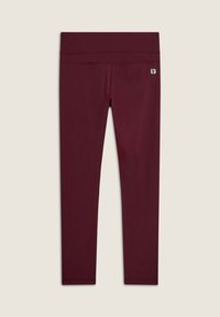 Leggings sportivi bordeaux realizzati in materiale elastico, con una vita alta e senza motivi visibili. Texture liscia con hardware minimo.