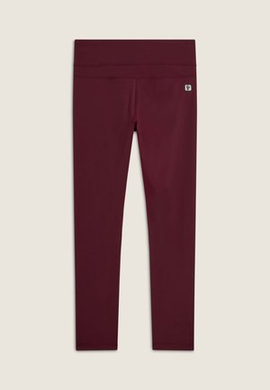 Leggings sportivi bordeaux realizzati in materiale elastico, con una vita alta e senza motivi visibili. Texture liscia con hardware minimo.