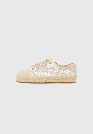 Beige sequined sneaker with a textured tan canvas toe cap, jute-woven midsole, and lace-up closure.