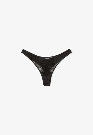 Black lace thong with floral embroidered pattern, featuring thin sides and a sheer texture, designed for minimal coverage.