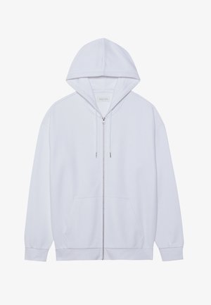 Felpa bianca con zip realizzata in tessuto morbido, dotata di cappuccio regolabile con lacci, tasche frontali e maniche a costine. Design semplice e pulito.
