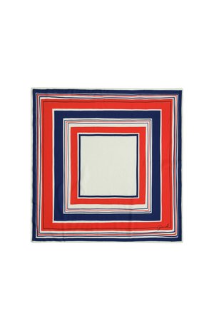 Foulard carré avec des rayures concentriques rouges, bleu marine et blanches, et une petite signature dans un coin.