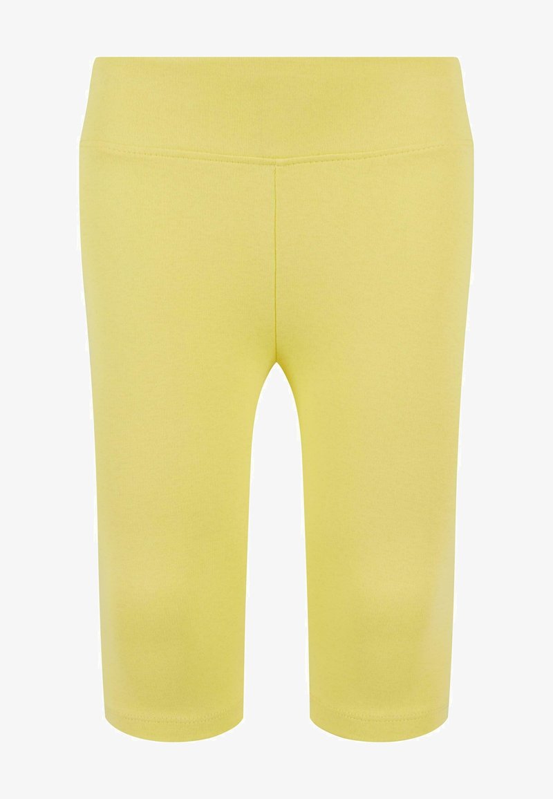 Rumene športne legice z gladko teksturo, dolžine do sredine stegna in brezšivnim pasom, zasnovane za udobje in fleksibilnost.