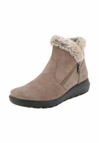 Stivaletti in suede marrone con colletto in pelliccia sintetica, dotati di una cerniera laterale e di una suola in gomma nera per una migliore aderenza.