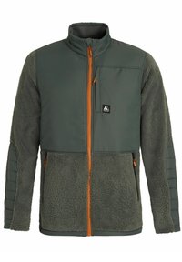 Giacca in pile di colore verde scuro con una texture morbida, zip arancio e dettagli in contrasto. Presenta una tasca sul petto con zip e tessuto delle maniche a contrasto.