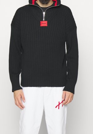 Stickad tröja - black