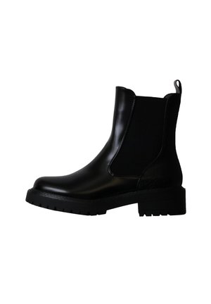 Bottine Chelsea en cuir noir avec panneau latéral élastique, semelle à crampons, petit talon et languette à l’arrière.
