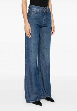 Højtaljede, brede jeans i mørkeblå denim. Har store lommer, lynlås og tonalt syning. Taperet ved kanten med en pæn finish.