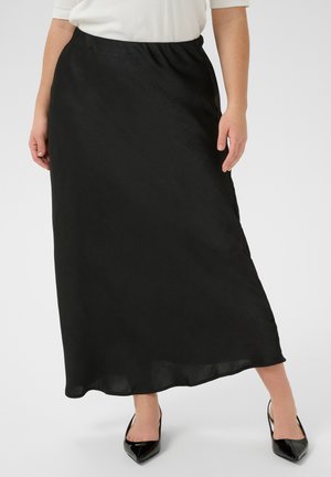 Jupe maxi noire en tissu léger et fluide avec une texture douce. Elle est dotée d'une taille élastique et d'un design lisse et simple.