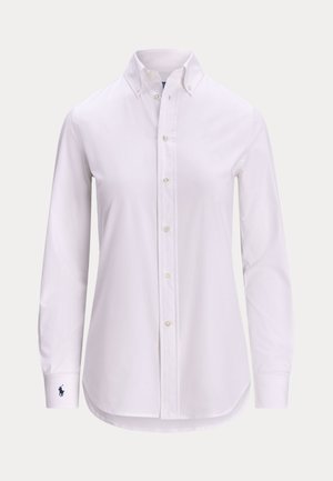 White long-sleeve button-down shirt with a buttoned collar and a small embroidered logo on the left cuff.