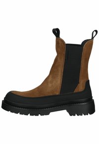 Brown suede ankle boot with a black rubber sole, elastic side panels, pull tabs, and a rounded toe design. Sturdy with textured accents.