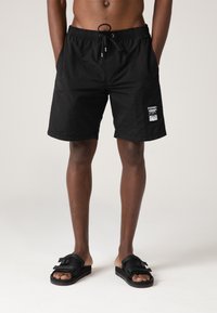 Former SWANS BAGGY TRUNK - Swimming trunks - navy