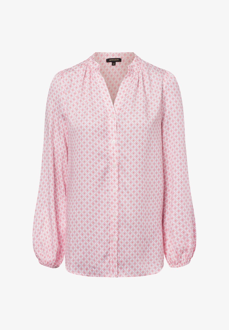 Light pink blouse with a diamond pattern in darker pink. Features a button-up front, long sleeves, and gathered texture at the neckline.