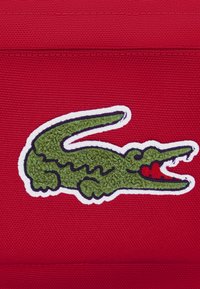 Lacoste CORE SOLID - Skolväska - red