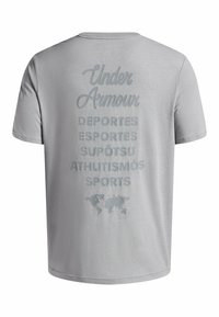 Gray t-shirt featuring "Under Armour" text in cursive and multiple languages in bold print on the back, with a world map graphic below.