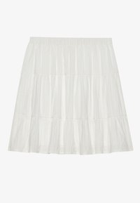 Jupe mini blanche à volants avec taille élastique et fines rayures verticales texturées.