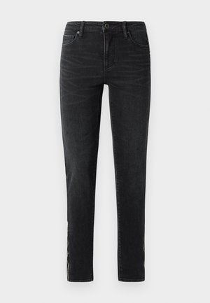 Zwarte spijkerbroek van denim met een slim fit, klassiek vijf-pocket ontwerp en een subtiele textuur. Afgewerkt met decoratieve stiksels langs de zijna naden.