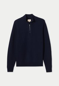 Marinblå pullovertröja med texturerad finish, halvlång dragkedja i kragen och långa ärmar. Tillverkad av mjukt stickat tyg för komfort.