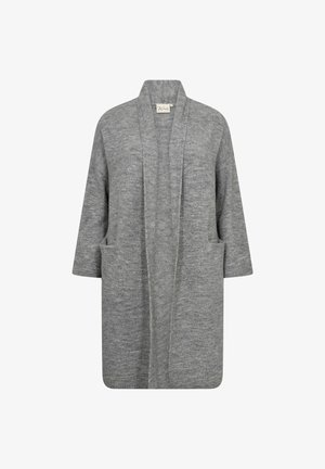 Hallikas kardigan, mis on valmistatud pehmest ja tekstuurilisest kudumisest. Omab šalli kraed, avatud esiosa ja kahte küljetaskut. Keskmise pikkusega varrukad.