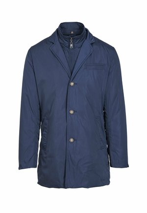 Giacca trapuntata blu navy con colletto a rever, tre bottoni, tasche laterali e strato interno con zip. Texture liscia, design casual.