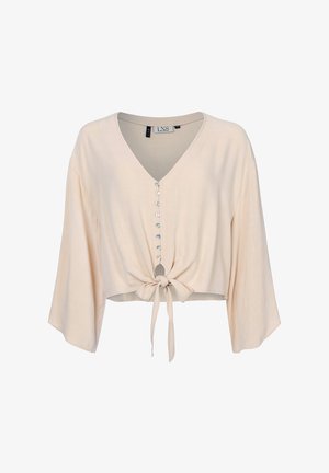 Licht beige cropped blouse met een V-hals, belletjesmouwen, een knoopsluiting aan de voorkant en een gestrikt knoopdetail aan de zoom. Glad stoftextuur.