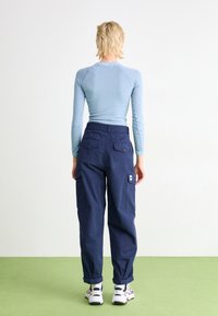 Carhartt WIP COLLINS PANT - Kargopüksid - air force blue