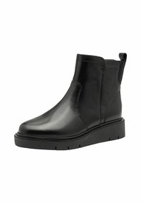 Schwarze Leder-Ankle-Boots mit glatter Oberfläche, ausgestattet mit einer dicken Plattformsohle und elastischen Seitenpaneelen für ein einfaches Anziehen.
