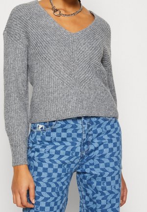 Stickad tröja - grey