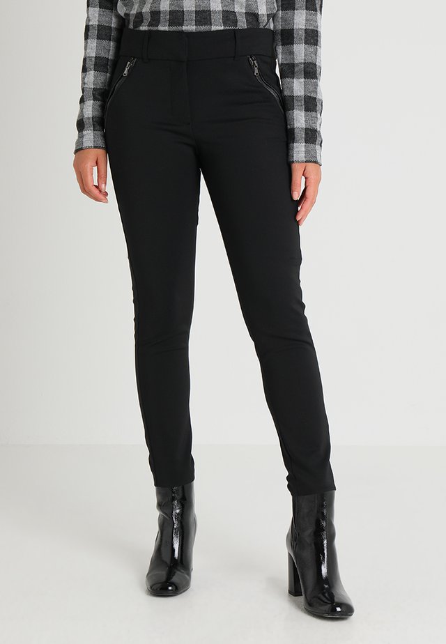 NIGERIA - Trousers - black