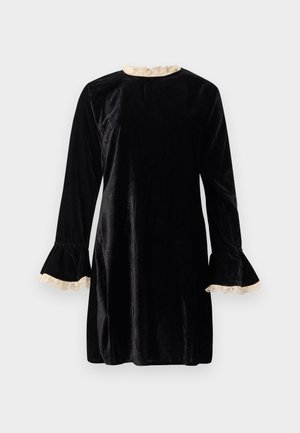 Black velvet dress with long sleeves, flared cuffs featuring cream lace trim, and a round neckline. Smooth texture with a knee-length hem.
