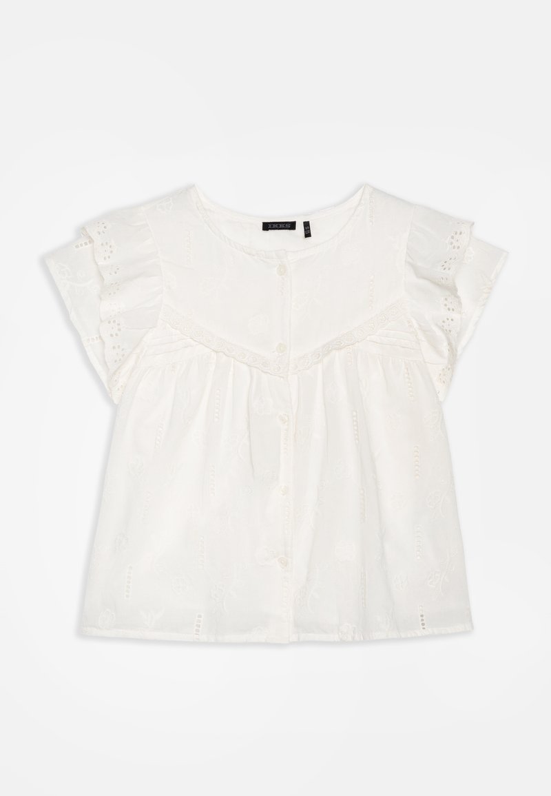 Blouse en coton blanc avec des manches courtes à volants, un design volumineux, des motifs floraux brodés et une fermeture à boutons à l'avant.