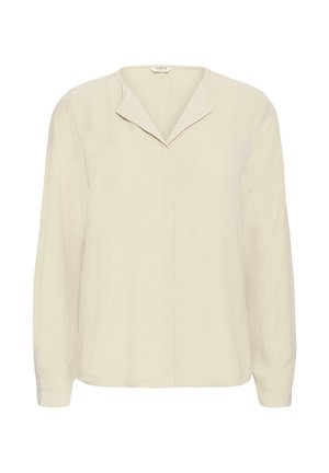Bluză bej cu mânecă lungă, cu un guler în formă de V, dintr-un material texturat și cu un croi drept. Prezintă manșete cu butoni și o strălucire subtilă.