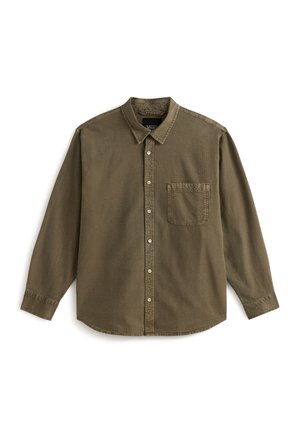 Olive green long-sleeve button-up shirt with a collar, front pocket, and textured fabric. Features white buttons and a curved hem.