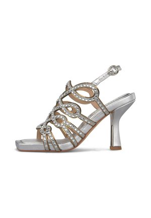 Sandalia plateada de tacón alto con puntera abierta, tiras anudadas adornadas con pedrería y hebilla ajustable en el tobillo.
