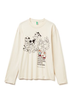 Langärmliges cremefarbenes Hemd mit schwarz-weißen Disney-Charakteren und den farbigen Chip und Chap über dem Text "Diejenigen, die zusammen viben, gedeihen zusammen."
